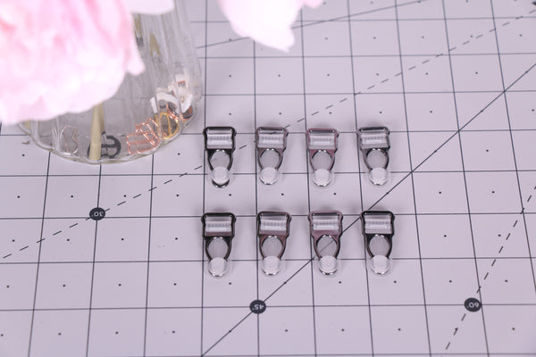 Clips de liguero Gunmetal Gris metalizado.
