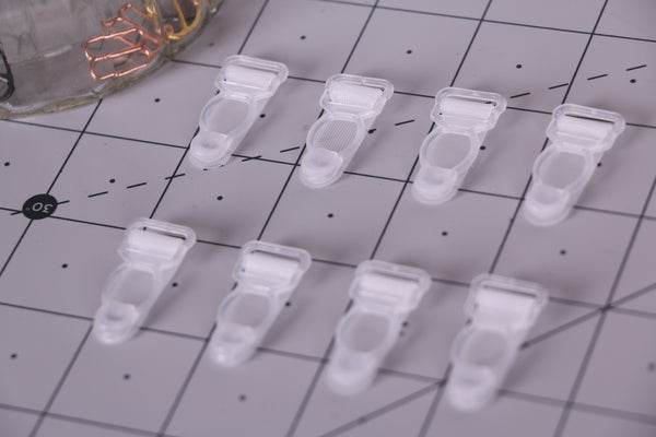 Clips de liguero color transparente