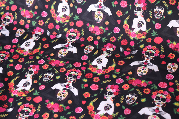 Tela con estampado Frida La Catrina y Calaveras.