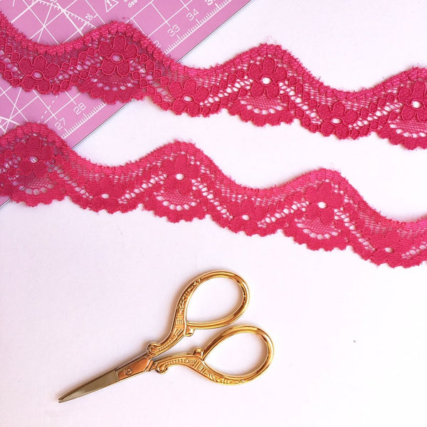 Cinta de encaje elástica rosa fucsia