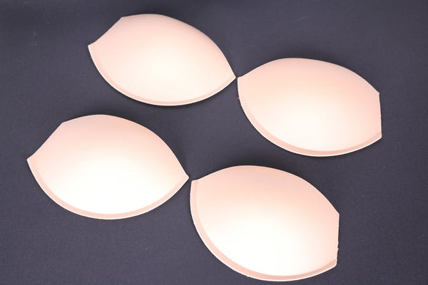 Swimwear bra cups with inserts