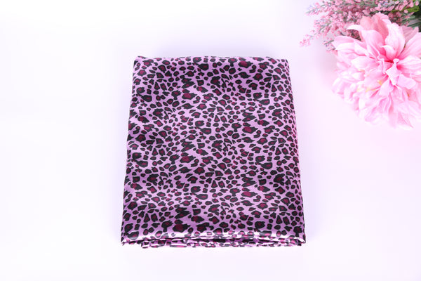 pink leopard satin charmeuse fabric. leopard lingerie fabric