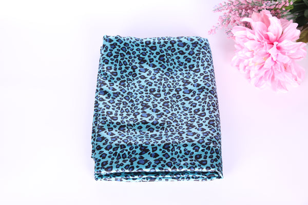 blue leopard satin charmeuse fabric. lingerie fabric