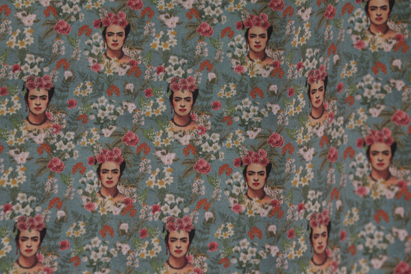 Frida Kahlo cotton fabric with flowers and greenish blue background